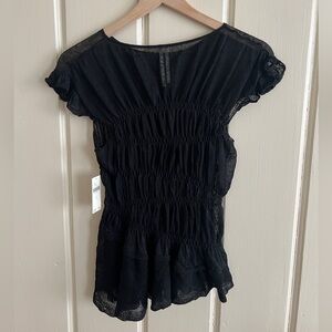 Anthropologie asymmetric sheer black top
